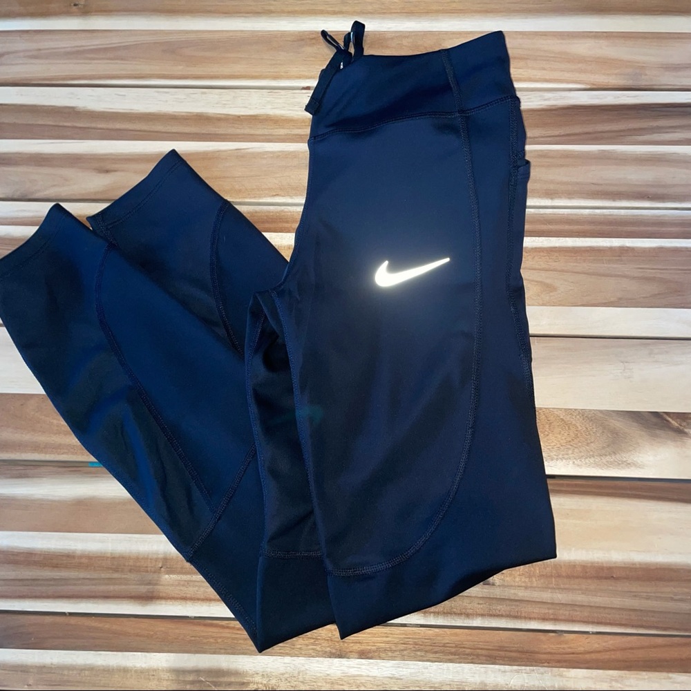 NWOT Nike running leggings size medium